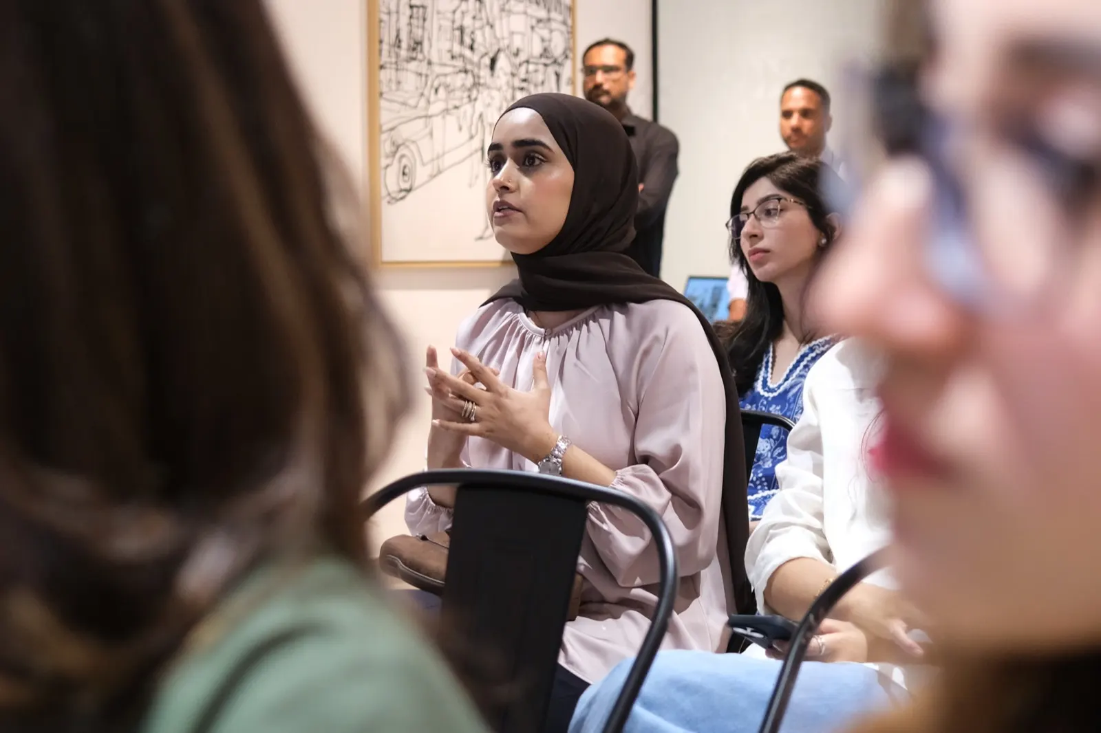 A fellow discussing an encounter with colleagues during a review session